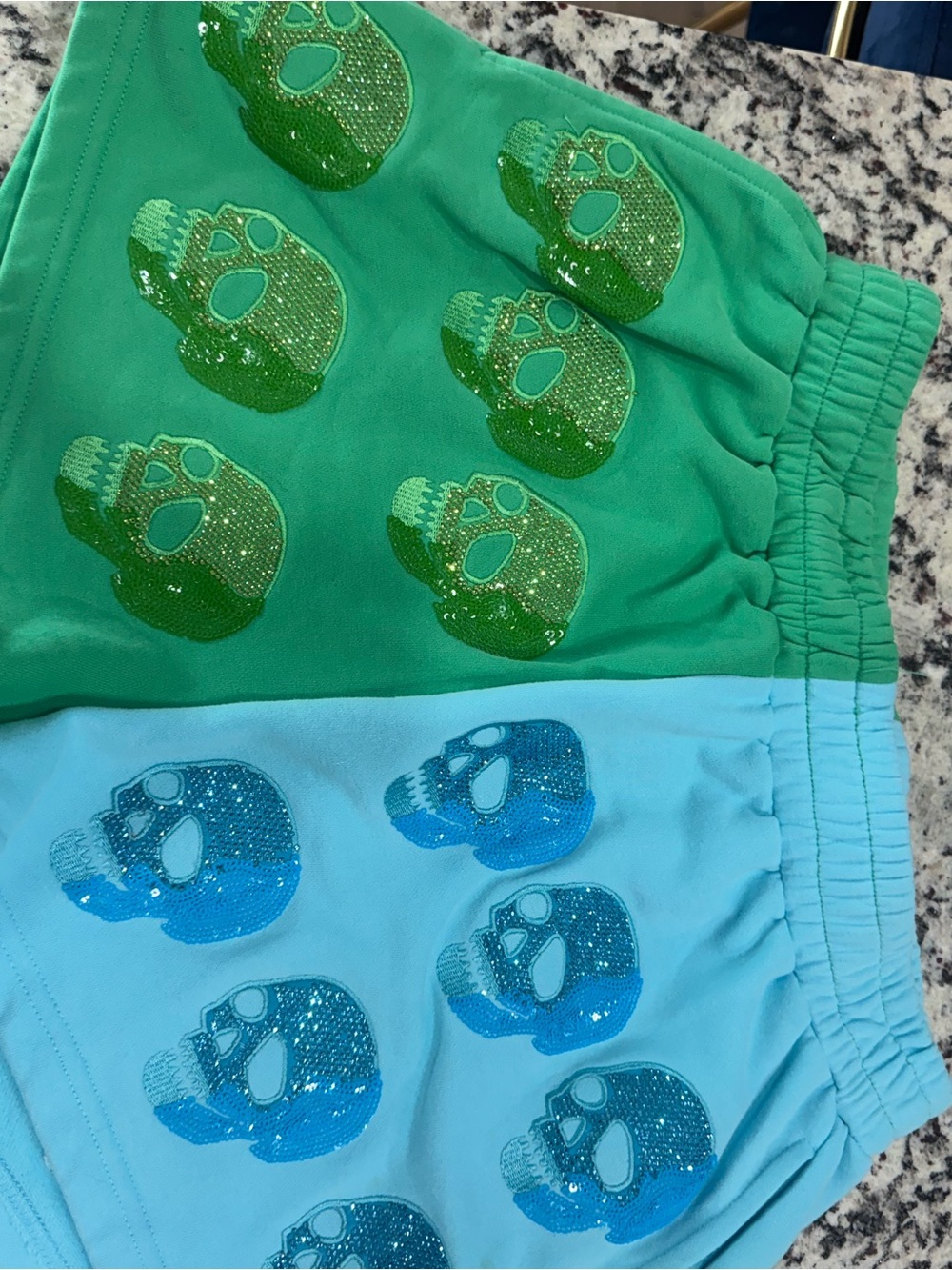 QUEEN OF SPARKLES Green & Blue Skull Print Shorts